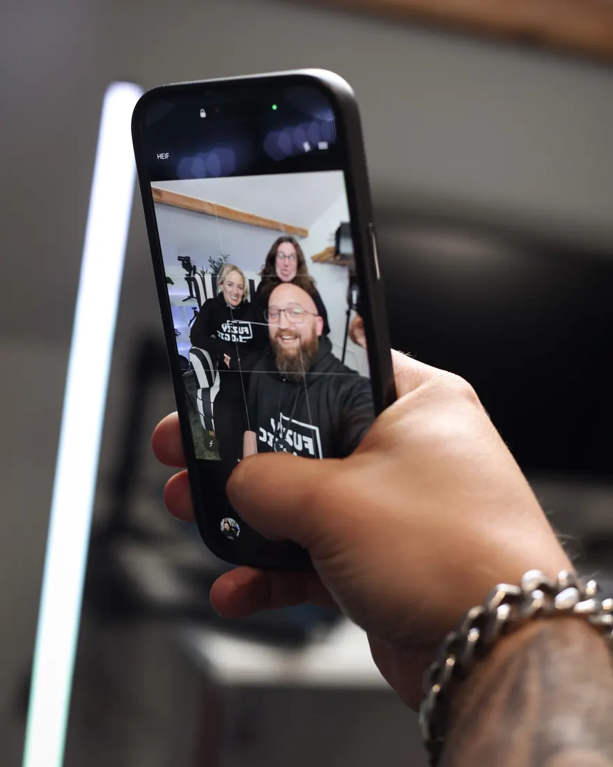 The Fuzzy Studio team taking a selfie for social media