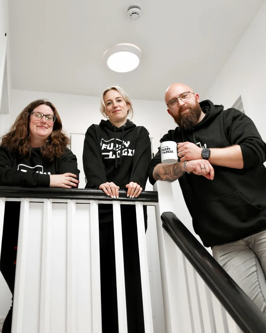 The Fuzzy Studio team in Fuzzy Logic hoodies
